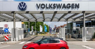 A car drives past the Zwickau Volkswagen Plant, Zwickau, eastern Germany, July 9, 2026. (AFP Photo)