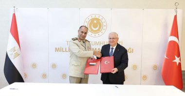 National Defense Minister Yaşar Güler (R) shakes hands with his Egyptian counterpart Ashraf Salem Zaher after signing the memorandum, Ankara, Türkiye, July 13, 2026. (DHA Photo)