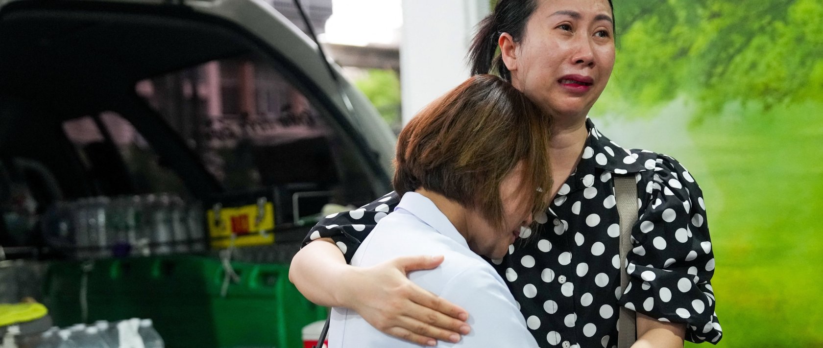 Family members mourn as they receive the body of a victim at the Police Hospital morgue, following a deadly fire at a pub, Bangkok, Thailand, July 13, 2026. (Reuters Photo)