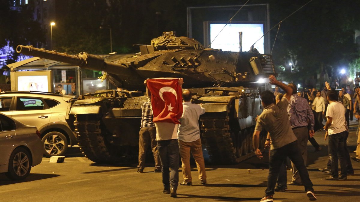 People attempt to stop tanks commanded by putschists, Ankara, Türkiye, July 16, 2016. (AP Photo)