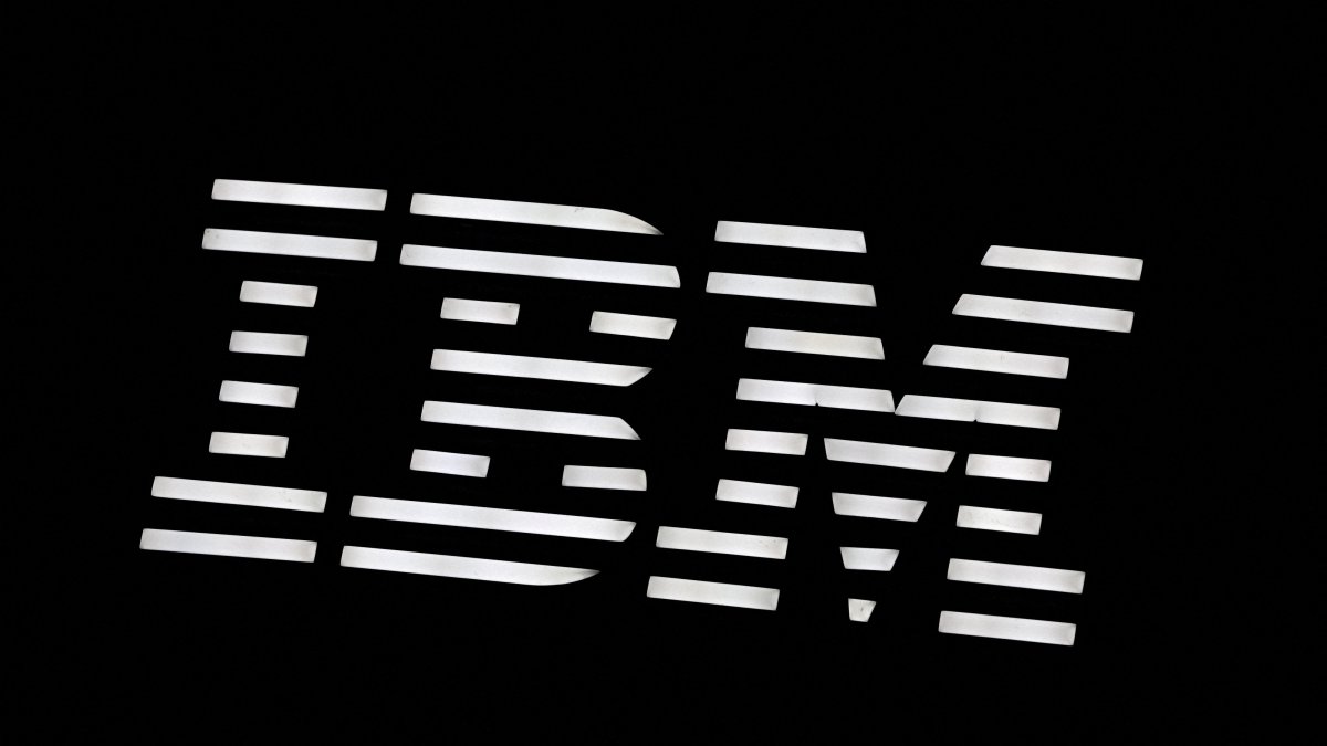 The logo of IBM is displayed over a booth at the Web Summit digital trade show in Vancouver, British Columbia, Canada, May 12, 2026. (Reuters Photo)