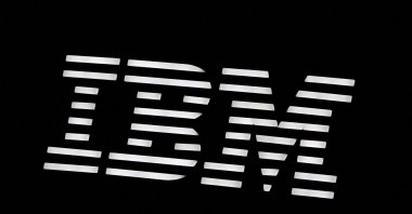 The logo of IBM is displayed over a booth at the Web Summit digital trade show in Vancouver, British Columbia, Canada, May 12, 2026. (Reuters Photo)