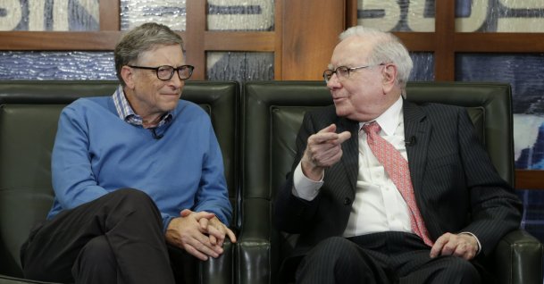 Berkshire Hathaway Chairman and CEO Warren Buffett (R) and Bill Gates, Microsoft co-founder and director at Berkshire Hathaway, sit together during an interview in Omaha, U.S., May 8, 2017. (AP Photo)