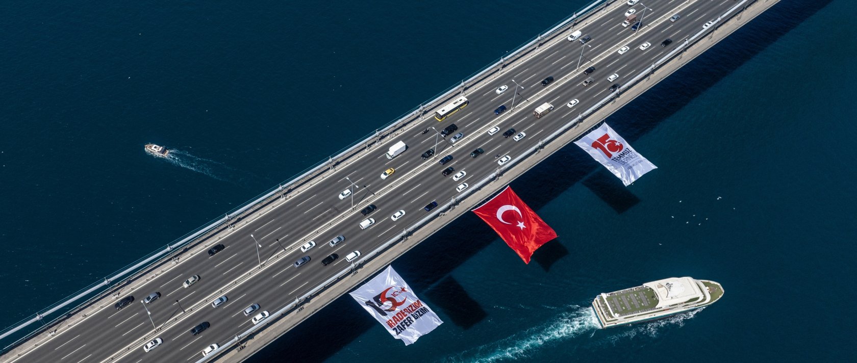 A Turkish flag is displayed on the Fatih Sultan Mehmet Bridge on the anniversary of the July 15 coup attempt, Istanbul, Türkiye, July 4, 2026. (AA Photo)