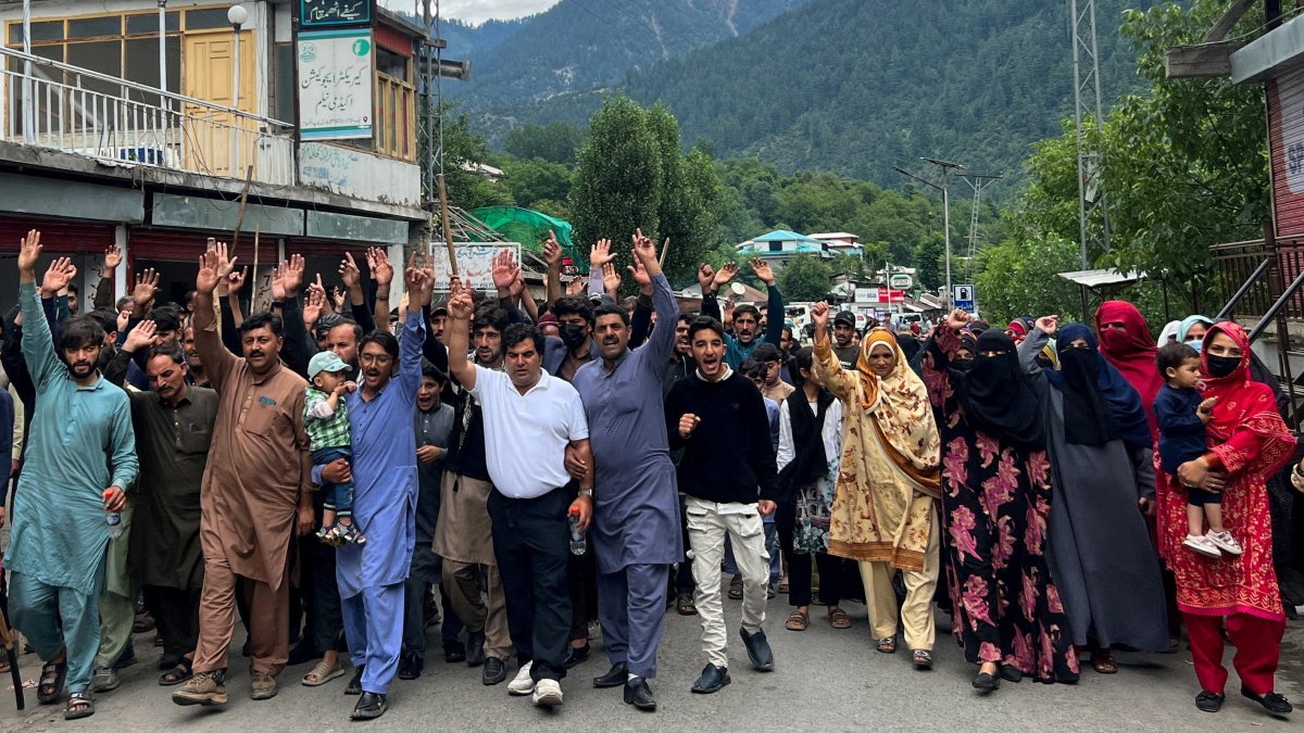 People chant slogans as they walk during a protest and shutter-down strike called by the banned Joint Awami Action Committee (JAAC), in Neelum Valley, Pakistan-controlled Kashmir, June 21, 2026. (Reuters Photo)