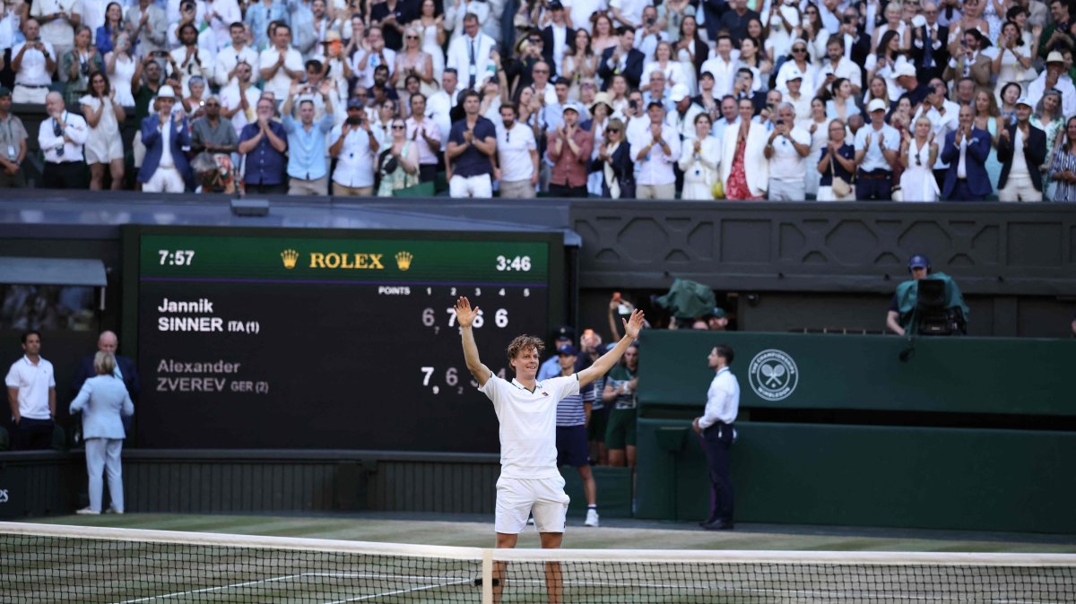 Italy's Jannik Sinner celebrates winning against Germany's Alexander Zverev during their men's singles final tennis match on the 14th day of the 2026 Wimbledon Championships at The All England Lawn Tennis and Croquet Club in Wimbledon, southwest London, U.K., July 12, 2026. (AFP Photo)