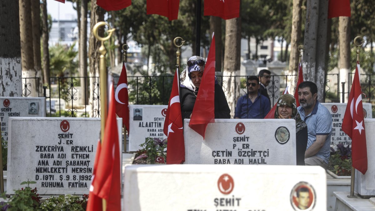 People visit the martyrs' cemetery during commemorations marking July 15 Democracy and National Unity Day, Mersin, Türkiye, July 15, 2026. (AA Photo)
