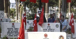 People visit the martyrs' cemetery during commemorations marking July 15 Democracy and National Unity Day, Mersin, Türkiye, July 15, 2026. (AA Photo)