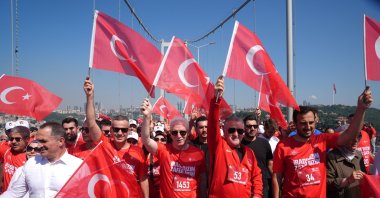 Youth and Sports Minister Osman Aşkın Bak (2nd R) and Istanbul Governor Davut Gül (3rd L) lead the 15 July Democracy and Martyrs Commemoration March was organized by the Turkish Athletics Federation, Istanbul, Türkiye, July 15, 2026. (AA Photo)