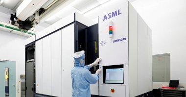 An assembly engineer works on a TWINSCAN DUV lithography system at ASML, Veldhoven, Netherlands, June 16, 2023. (Reuters Photo)