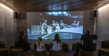 People watch a documentary on the coup attempt at a museum dedicated to the public resistance to the attempt, Istanbul, Türkiye, July 15, 2026. (AA Photo)