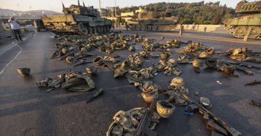 Clothes and weapons belonging to soldiers involved in the coup attempt lie on the Bosporus Bridge, Istanbul, Türkiye, July 16, 2016. (Getty Images Photo)