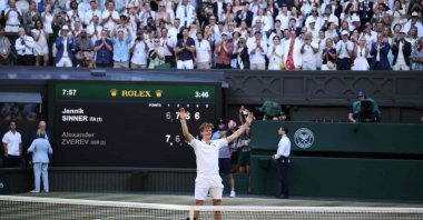 Italy's Jannik Sinner celebrates winning against Germany's Alexander Zverev during their men's singles final tennis match on the 14th day of the 2026 Wimbledon Championships at The All England Lawn Tennis and Croquet Club in Wimbledon, southwest London, U.K., July 12, 2026. (AFP Photo)
