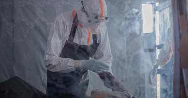 A doctor provides care to a patient with Ebola virus disease at the Rwampara Ebola Treatment Centre (ETC) in Bunia, Ituri, DR Congo, July 13, 2026. (AFP Photo)