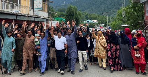 People chant slogans as they walk during a protest and shutter-down strike called by the banned Joint Awami Action Committee (JAAC), in Neelum Valley, Pakistan-controlled Kashmir, June 21, 2026. (Reuters Photo)