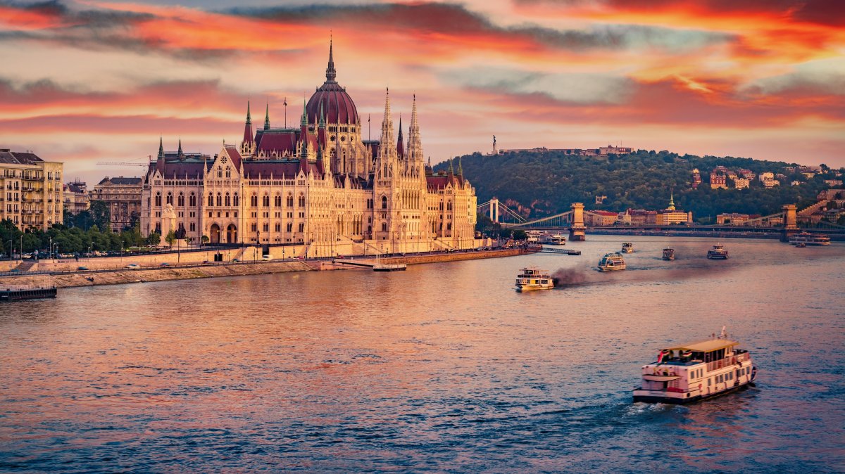 An undated aerial view of boats on Dunabe river with Parliament house on background, Budapest, Hungary. (Shutterstock Photo)