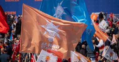 People wave AK Party flags during an election rally, Istanbul, Türkiye, March 24, 2024. (Shutterstock Photo)