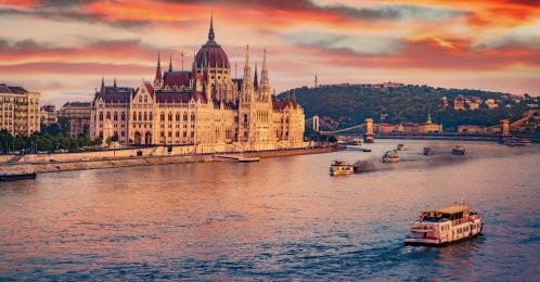 An undated aerial view of boats on Dunabe river with Parliament house on background, Budapest, Hungary. (Shutterstock Photo)