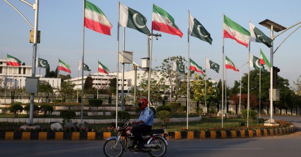 Pakistani and Iranian flags are displayed outside the President's House in Islamabad, Pakistan, 22 June 2026, ahead of Iranian President Masoud Pezeshkian’s expected official visit to the Pakistani capital.  EPA/SOHAIL SHAHZAD