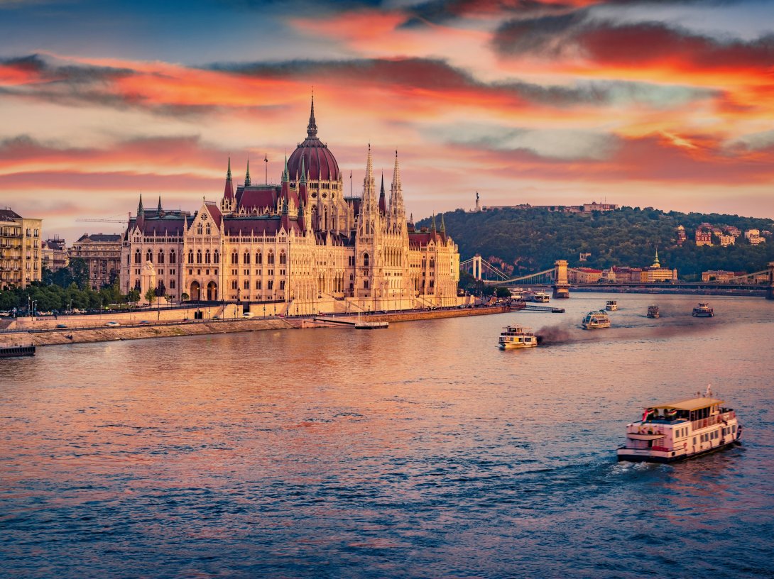An undated aerial view of boats on Dunabe river with Parliament house on background, Budapest, Hungary. (Shutterstock Photo)