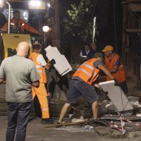 Communal workers clean debris at the site of a Russian strike on a residential area, Odesa, Ukraine, July 16, 2026. (EPA Photo)