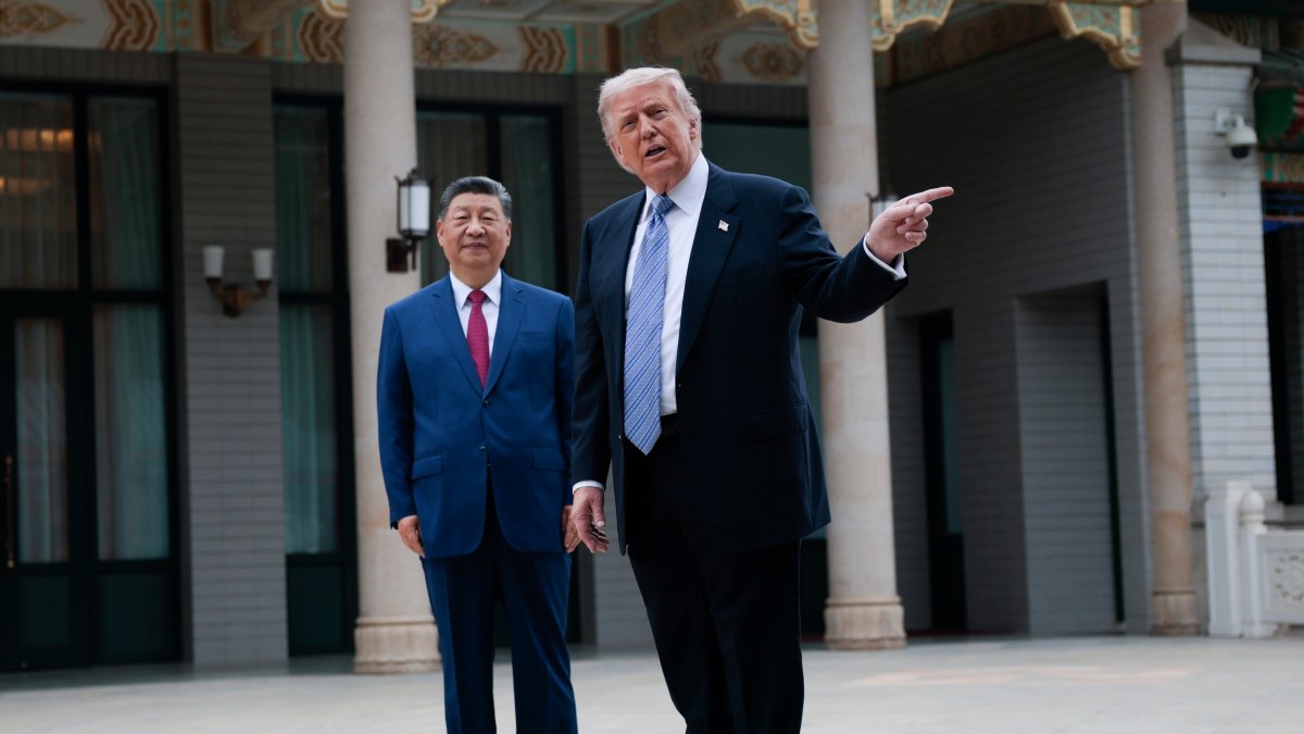 U.S. President Donald Trump (R) gestures as he speaks next to Chinese President Xi Jinping during a visit to the Zhongnanhai Garden, Beijing, China, May 15, 2026. (AP Photo)