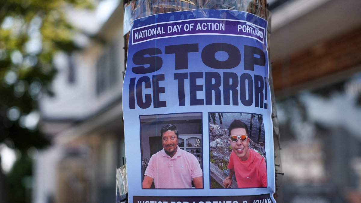 A poster calling for a national day of action against ICE hangs near a makeshift street-side memorial for Johan Sebastian Duran, a driver who was fatally shot on July 13 by U.S. Immigration and Customs Enforcement (ICE) agents, Biddeford, U.S., July 16, 2026. (Reuters Photo)