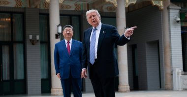 U.S. President Donald Trump (R) gestures as he speaks next to Chinese President Xi Jinping during a visit to the Zhongnanhai Garden, Beijing, China, May 15, 2026. (AP Photo)