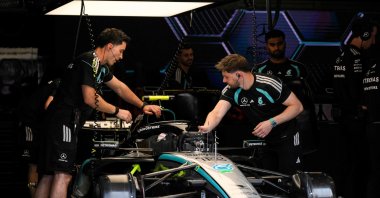 Mechanics work on the car of Mercedes' Italian driver Kimi Antonelli in the paddock before the first practice session at the Spa-Francorchamps circuit ahead of the Formula One Belgian Grand Prix, Spa, Belgium, July 17, 2026. (AFP Photo)