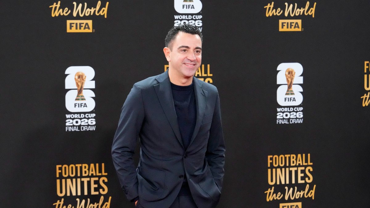 Xavi Hernandez poses for a photo as he arrives on the red carpet for a welcome reception ahead of the draw for the 2026 FIFA World Cup at the Kennedy Center, Washington, U.S., Dec. 4, 2025. (AP Photo)