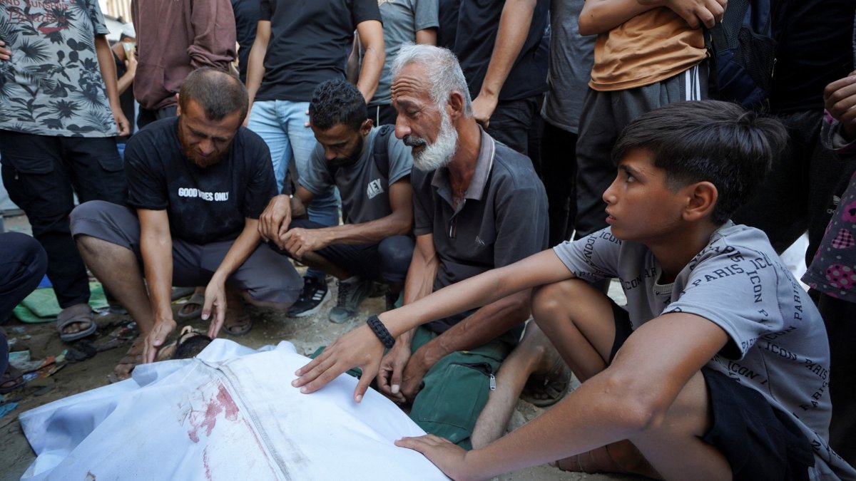 Mourners attend the funeral of a Palestinian who was killed in an Israeli strike at Al-Awda Hospital in Nuseirat refugee camp, Gaza Strip, Palestine, July 17, 2026. (Reuters Photo)