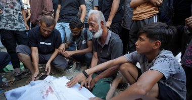 Mourners attend the funeral of a Palestinian who was killed in an Israeli strike at Al-Awda Hospital in Nuseirat refugee camp, Gaza Strip, Palestine, July 17, 2026. (Reuters Photo)