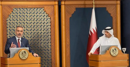 Qatar's Prime Minister and Foreign Minister Sheikh Mohammed bin Abdulrahman Al Thani (R) and Türkiye's Foreign Minister Hakan Fidan speak during a press conference, Doha, Qatar, March 19, 2026. (AP Photo)