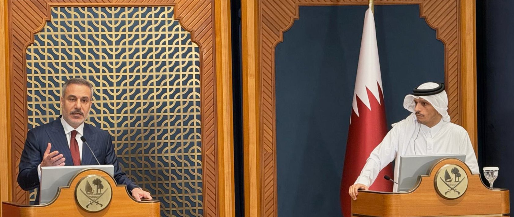 Qatar's Prime Minister and Foreign Minister Sheikh Mohammed bin Abdulrahman Al Thani (R) and Türkiye's Foreign Minister Hakan Fidan speak during a press conference, Doha, Qatar, March 19, 2026. (AP Photo)