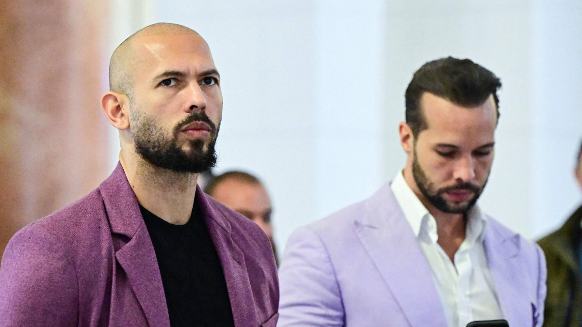 Andrew Tate (L) and his brother Tristan Tate are pictured inside The Court of Appeal in Bucharest, Romania, Dec. 10, 2024. (AFP Photo)