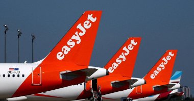Passengers board an easyJet aircraft at the Berlin Brandenburg Airport in Schoenefeld, Germany, April 21, 2026. (Reuters Photo)