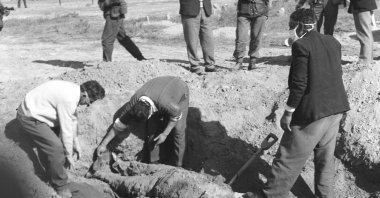 In this undated photo, Turkish Cypriots unearth a mass grave of people killed by EOKA terrorists in a village of Lefkoşa (Nicosia), Cyprus. (AA Photo)