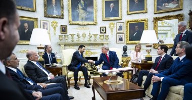 U.S. President Donald Trump (R) shakes hands with Iraqi Prime Minister Ali al-Zaidi during a meeting in the Oval Office of the White House, Washington, U.S., July 14, 2026. (EPA Photo)