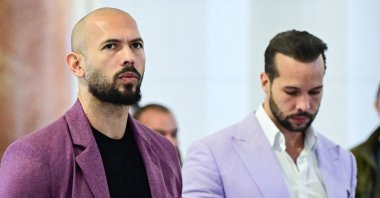 Andrew Tate (L) and his brother Tristan Tate are pictured inside The Court of Appeal in Bucharest, Romania, Dec. 10, 2024. (AFP Photo)