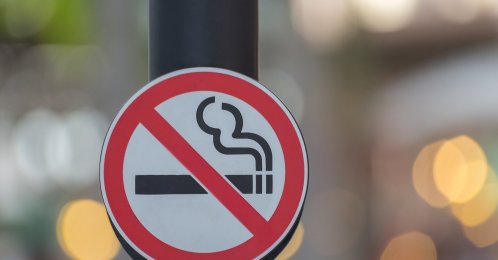A no-smoking sign is displayed on a wall. (Shutterstock Photo)