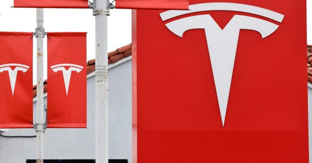 The Tesla logo is displayed at a Tesla dealership, Alhambra, California, U.S., July 2, 2026. (AFP Photo)
