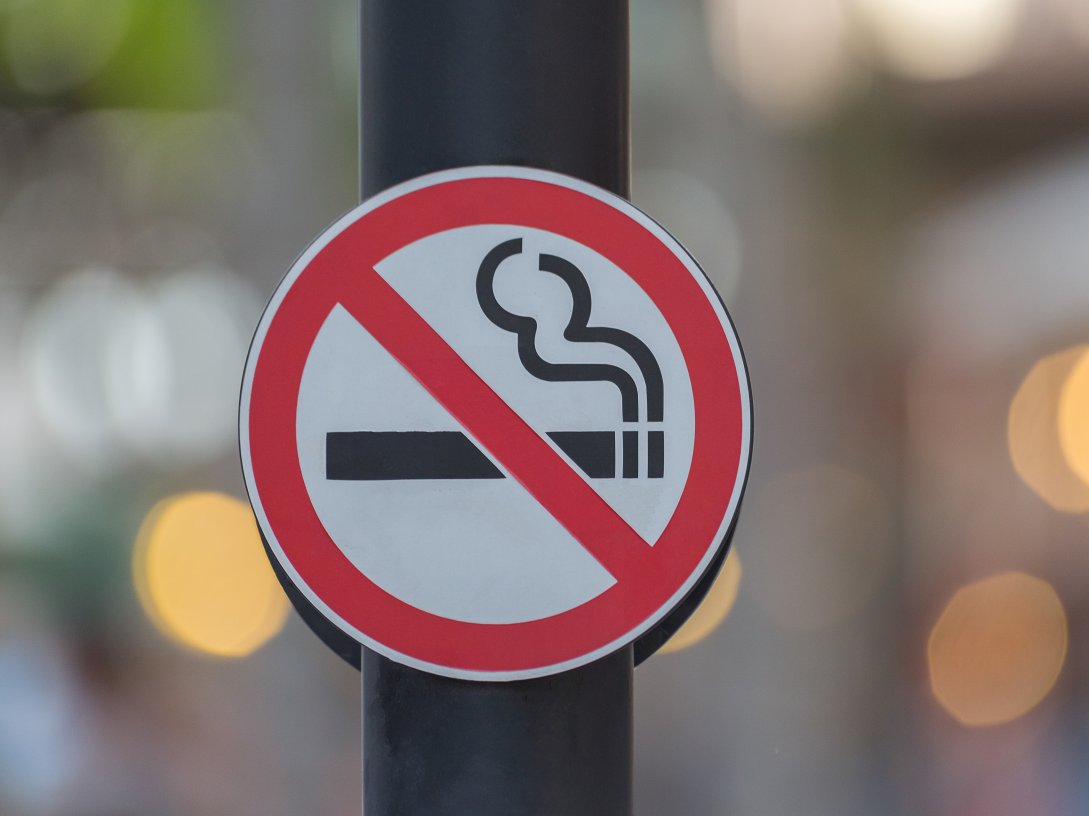 A no-smoking sign is displayed on a wall. (Shutterstock Photo)