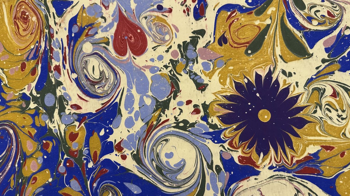 An ebru artwork created by a participant during a workshop at the Turkish Embassy Residence, Athens, Greece, July 17, 2026. (AA Photo)
