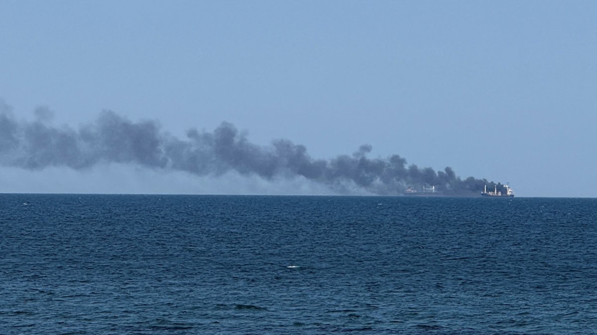 Smoke rises from a civilian vessel on fire amid Russia's attack on Ukraine, in Odesa, Ukraine, July 19, 2026. (Reuters Photo)