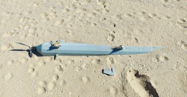 The wreckage of a suspected kamikaze drone is seen on Karaburun Beach, Istanbul, Türkiye, July 20, 2026. (IHA Photo)