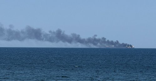 Smoke rises from a civilian vessel on fire amid Russia's attack on Ukraine, in Odesa, Ukraine, July 19, 2026. (Reuters Photo)