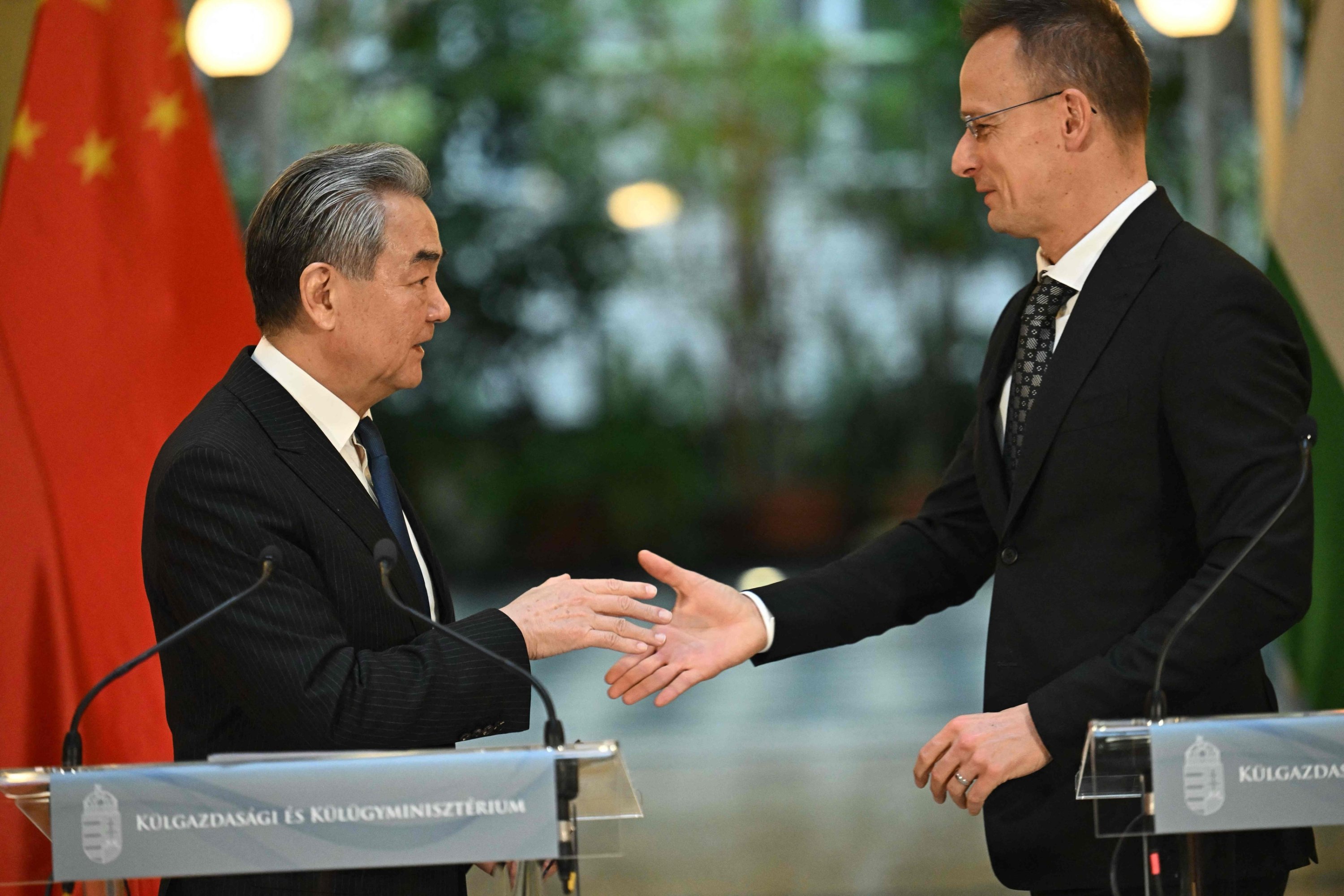 Then-Hungarian Foreign and Trade Minister Peter Szijjarto (R) and Chinese Foreign Minister Wang Yi shake hands after their joint press conference, Budapest, Hungary, Feb. 11, 2026. (AFP Photo)