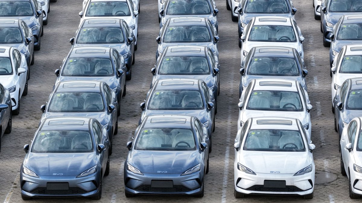 BYD cars are seen at a car storage yard before being loaded onto ships for export, Yantai, China's eastern Shandong province, July 19, 2026. (AFP Photo)