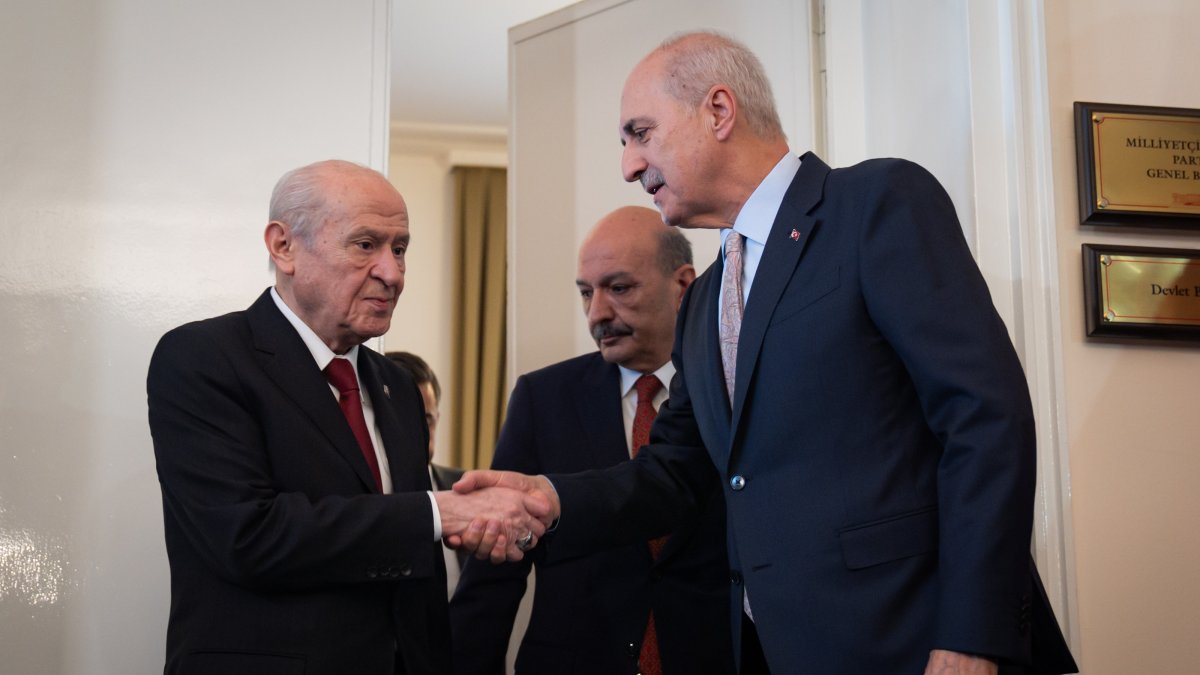 Parliament Speaker Numan Kurtulmuş (R) shakes hands with MHP leader Devlet Bahçeli (L), prior to their meeting, Ankara, Türkiye, July 21, 2026. (AA Photo)