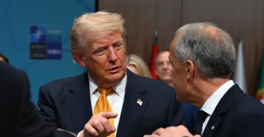 U.S. President Donald Trump (L) chats with Canadian Prime Minister Mark Carney on the sidelines of the NATO summit, Ankara, Türkiye, July 8, 2026. (AA Photo)